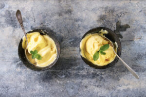 An up close image of dairy-free mango ice cream
