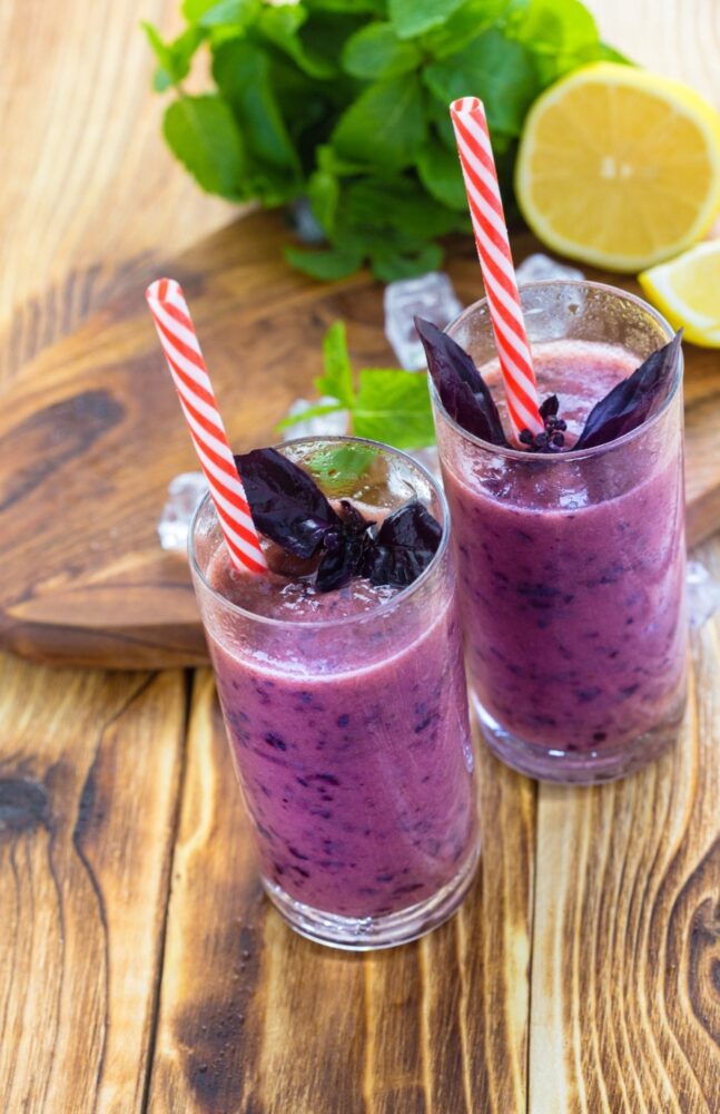 An up close image of two smoothies on a table