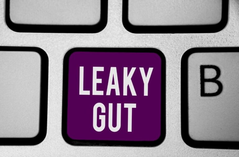 An image of a purple button on a keyboard displaying the words leaky gut