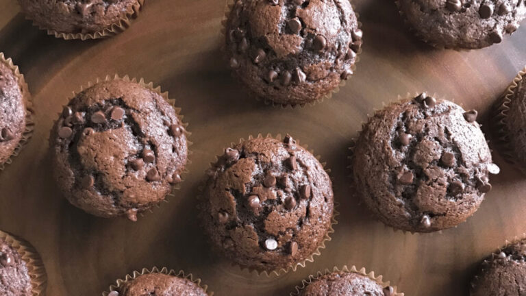 An up close image of chocolate chip pumpkin muffins